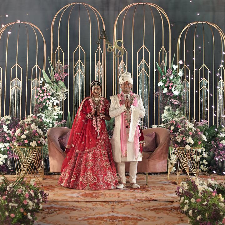 Bride and groom at their A&S wedding stage