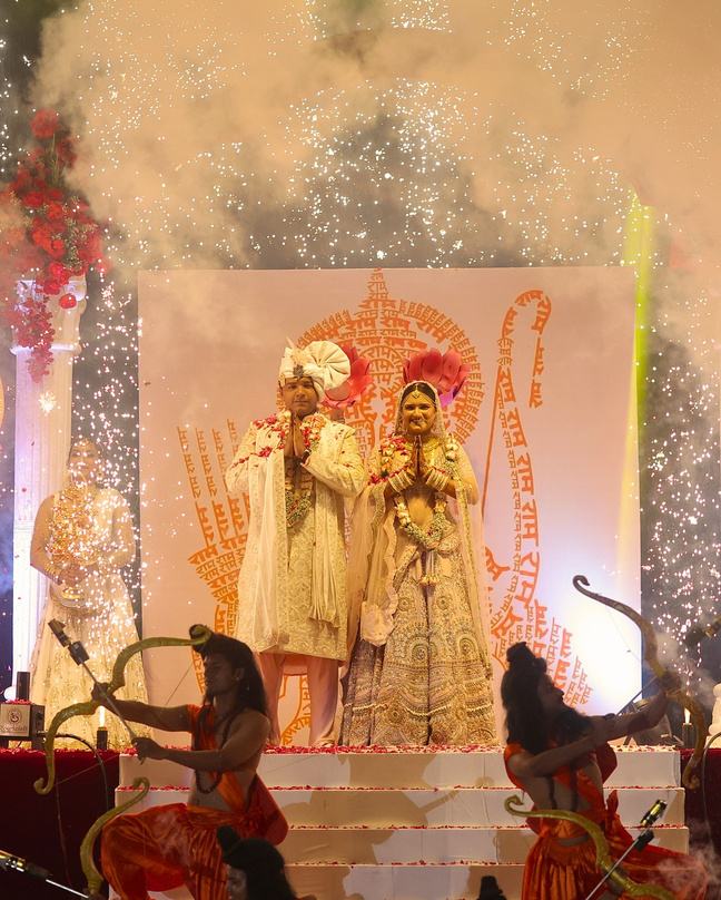 Bride and groom on a themed wedding stage