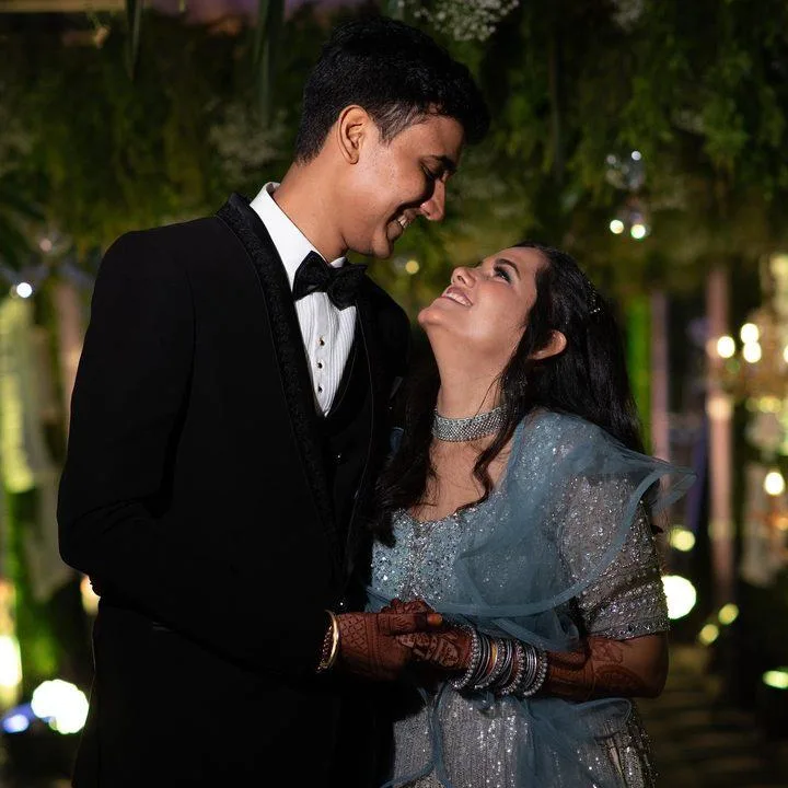 Bride and groom sharing a moment at their reception