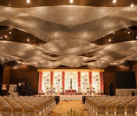 Elegant chandelier-lit wedding hall
