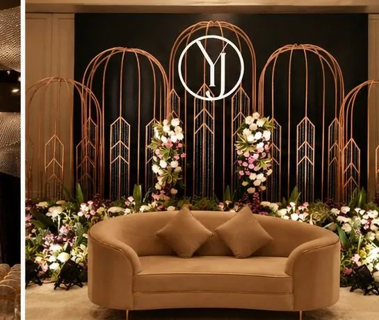 Elegant arch backdrop with a velvet sofa