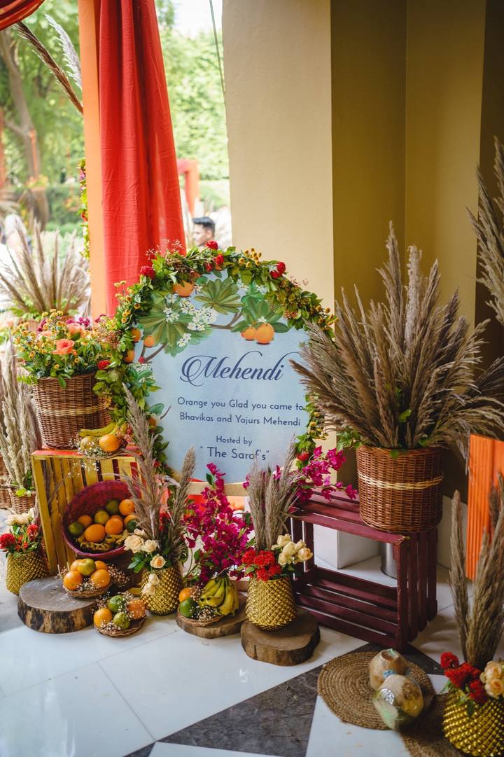 Welcome sign decorated with fruits and flowers
